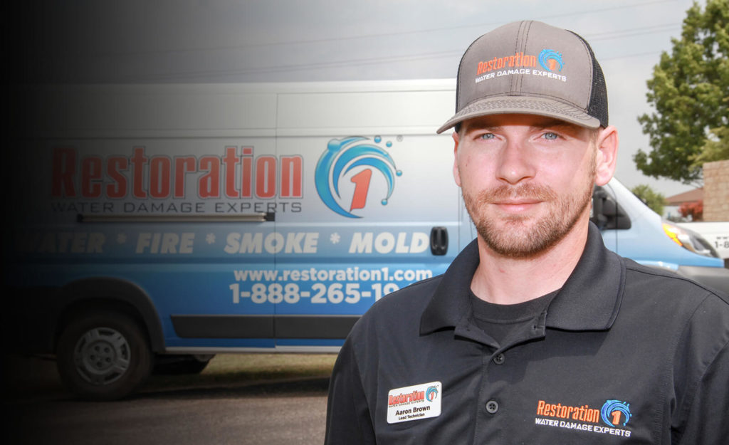 Restoration franchise restoration 1 technician in front of truck