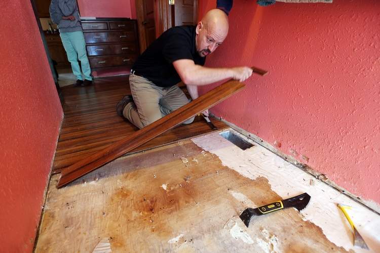 Restoration 1 Man laying floors